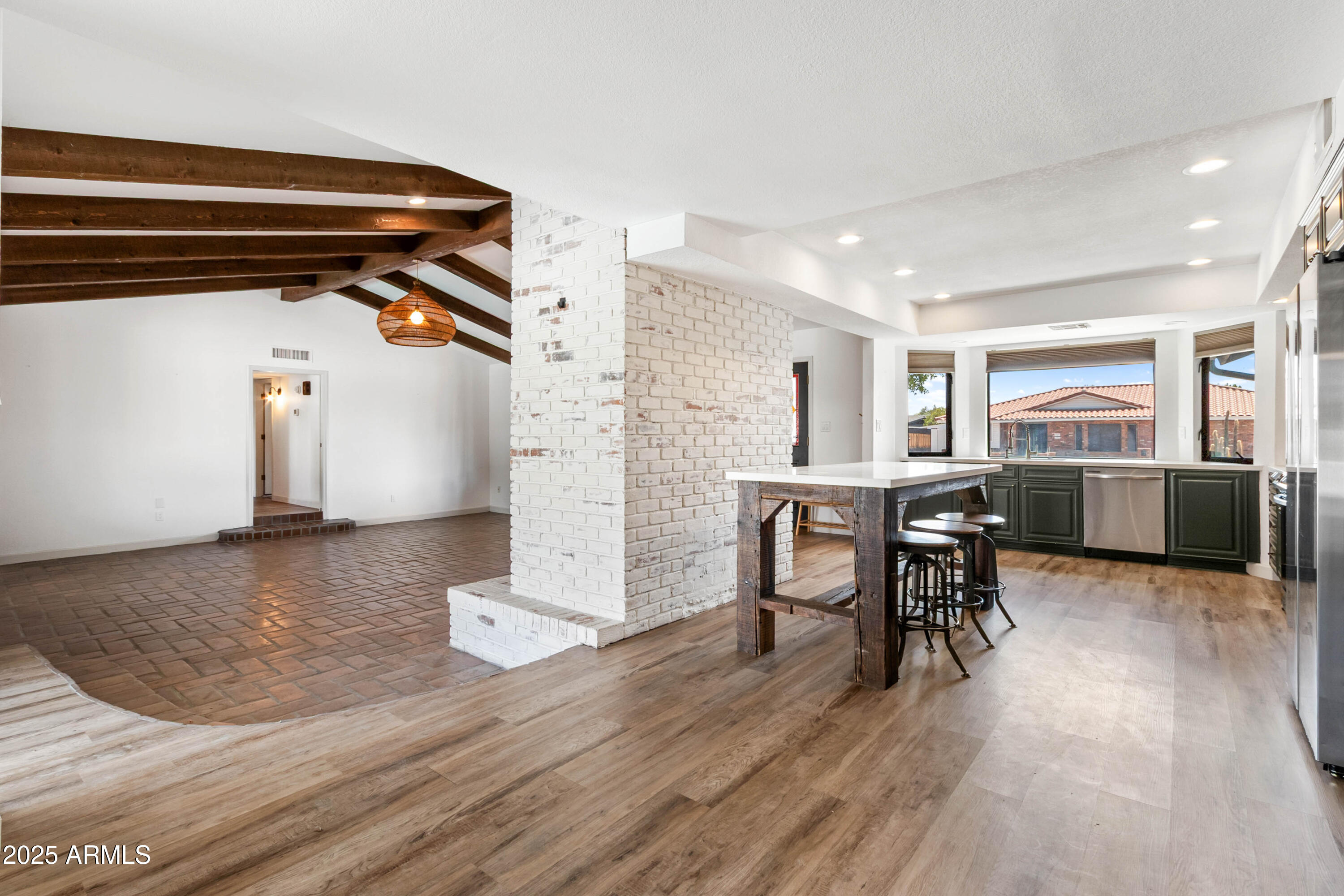 2228 East Jaeger Street Mesa, AZ 85213 - Photo 6 of 35 a view of a dining room with furniture and a table