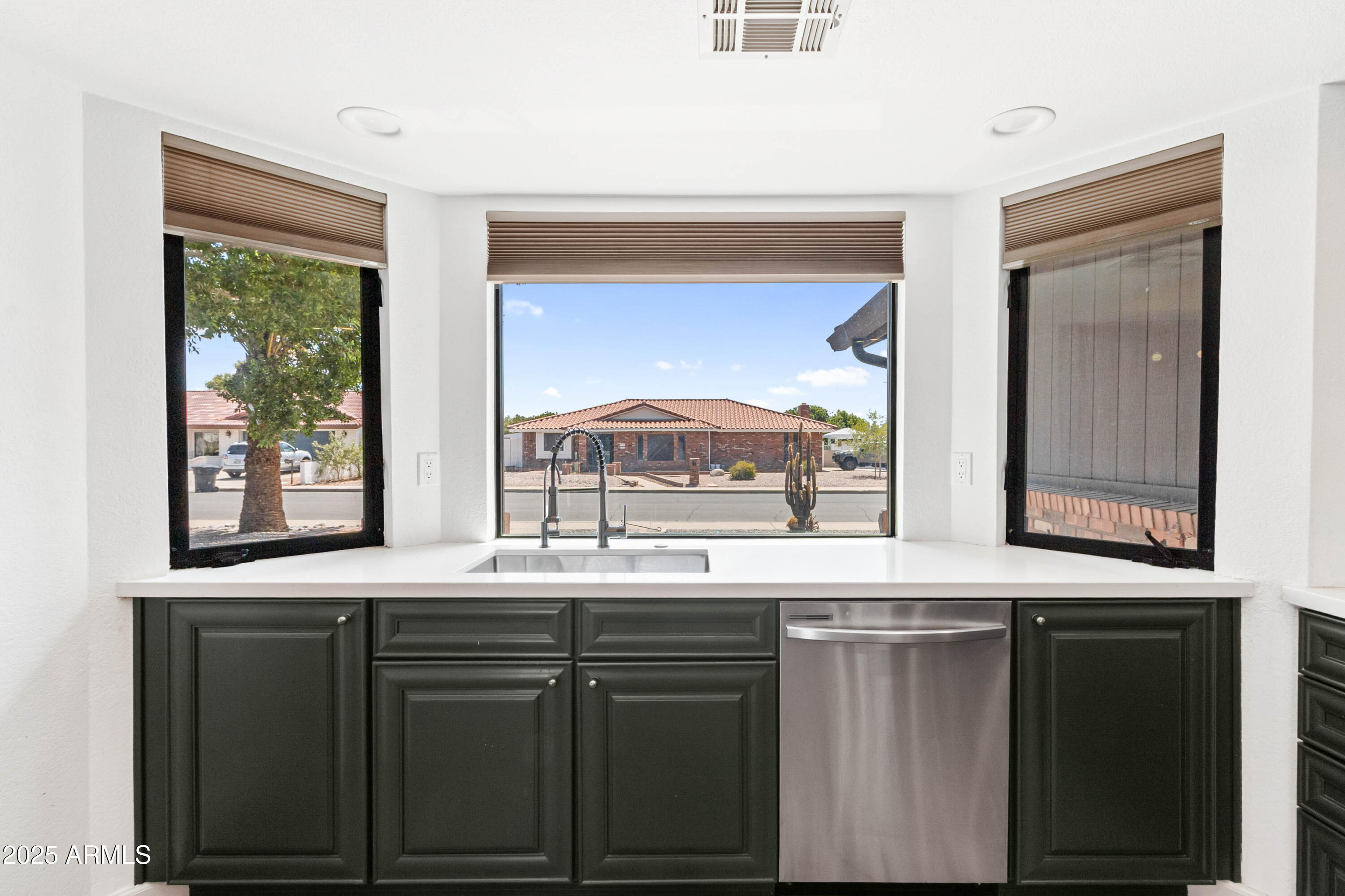 2228 East Jaeger Street Mesa, AZ 85213 - Photo 9 of 35 a sink with a window