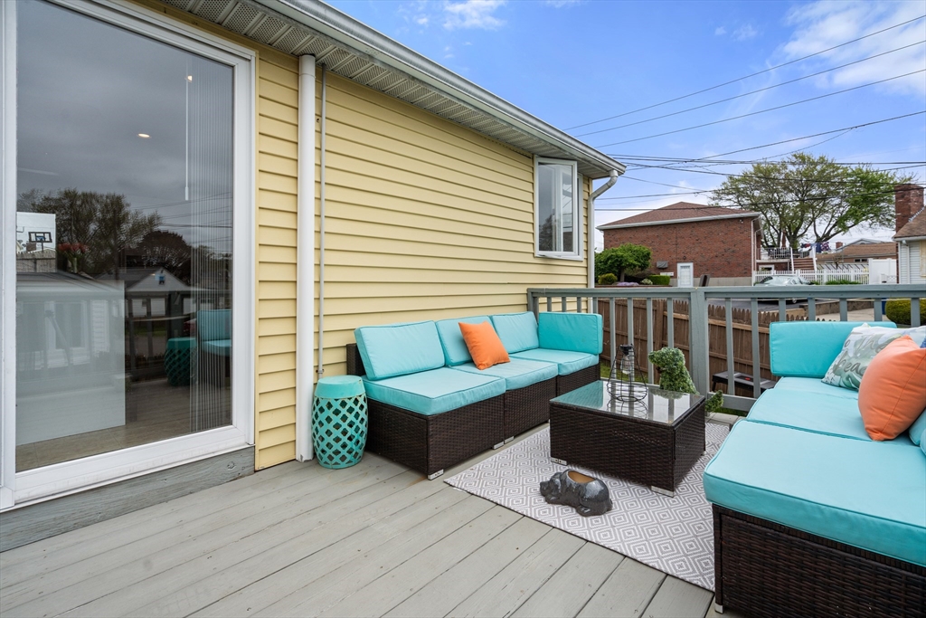 292 Rumney Road Revere, MA 02151 - Photo 20 of 24 a outdoor living space with furniture and a potted plant