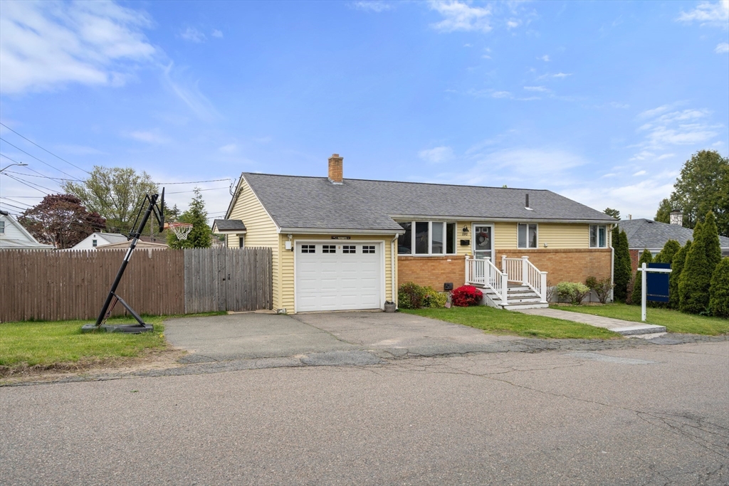 292 Rumney Road Revere, MA 02151 - Photo 2 of 24 a view of a house with porch and garden
