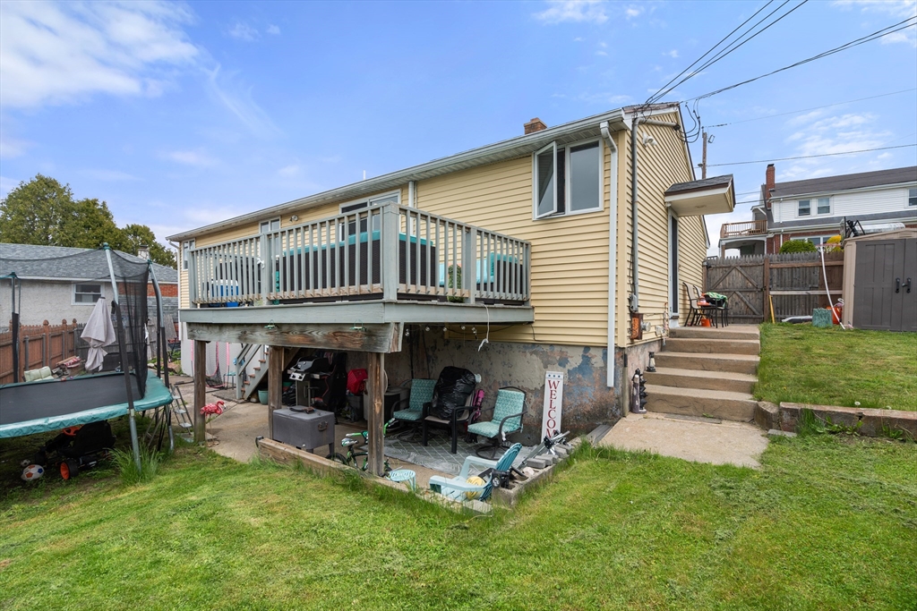 292 Rumney Road Revere, MA 02151 - Photo 24 of 24 a view of a house with a yard and sitting area