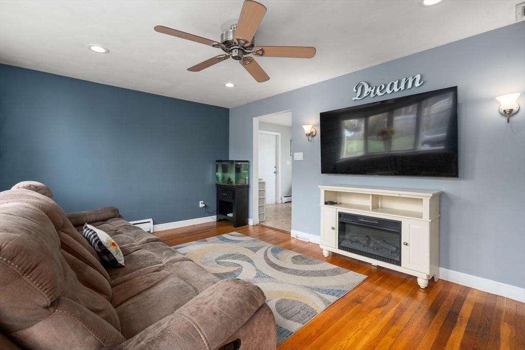 292 Rumney Road Revere, MA 02151 - Photo 7 of 24 a bedroom with a bed and a flat screen tv