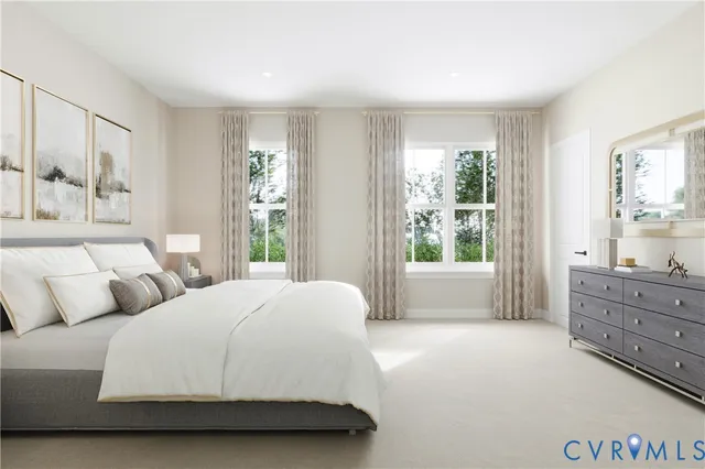 a spacious bedroom with a large bed and a window