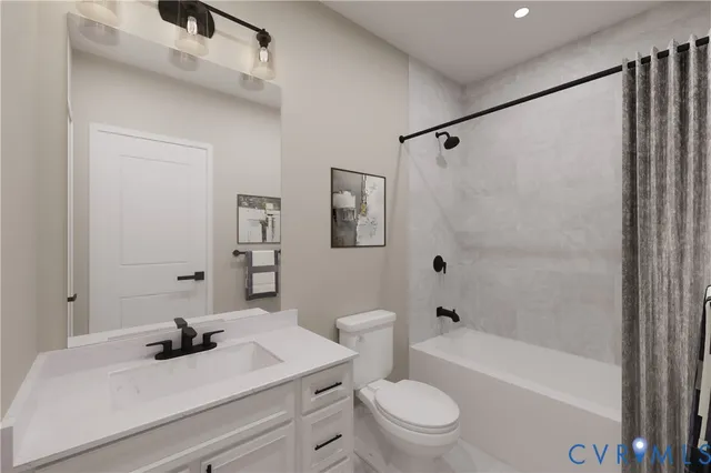 a bathroom with a sink a toilet and a bathtub