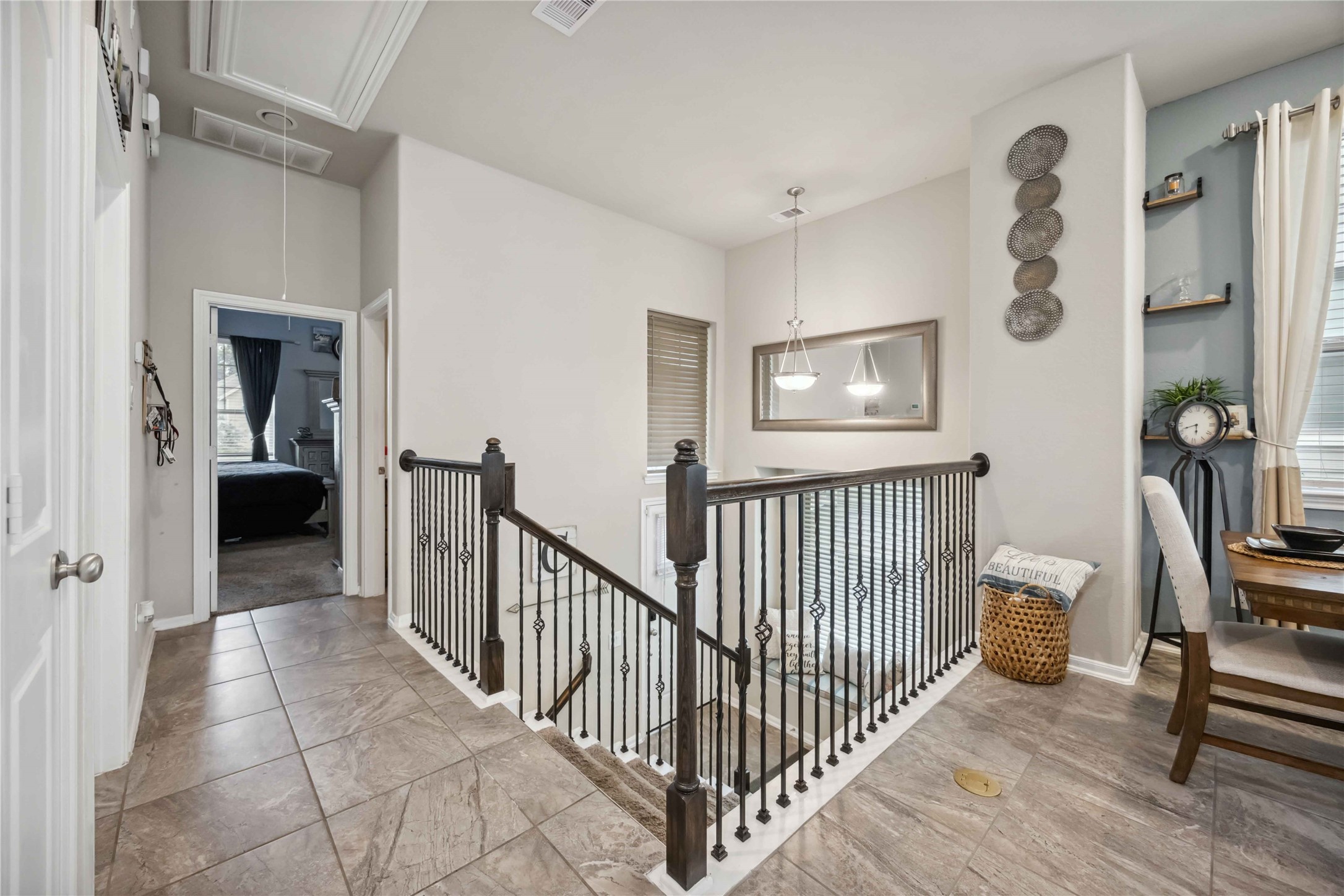 12419 Alora Bluff Trail Humble, TX 77346 - Photo 11 of 28 a view of a hallway to a livingroom with furniture and windows