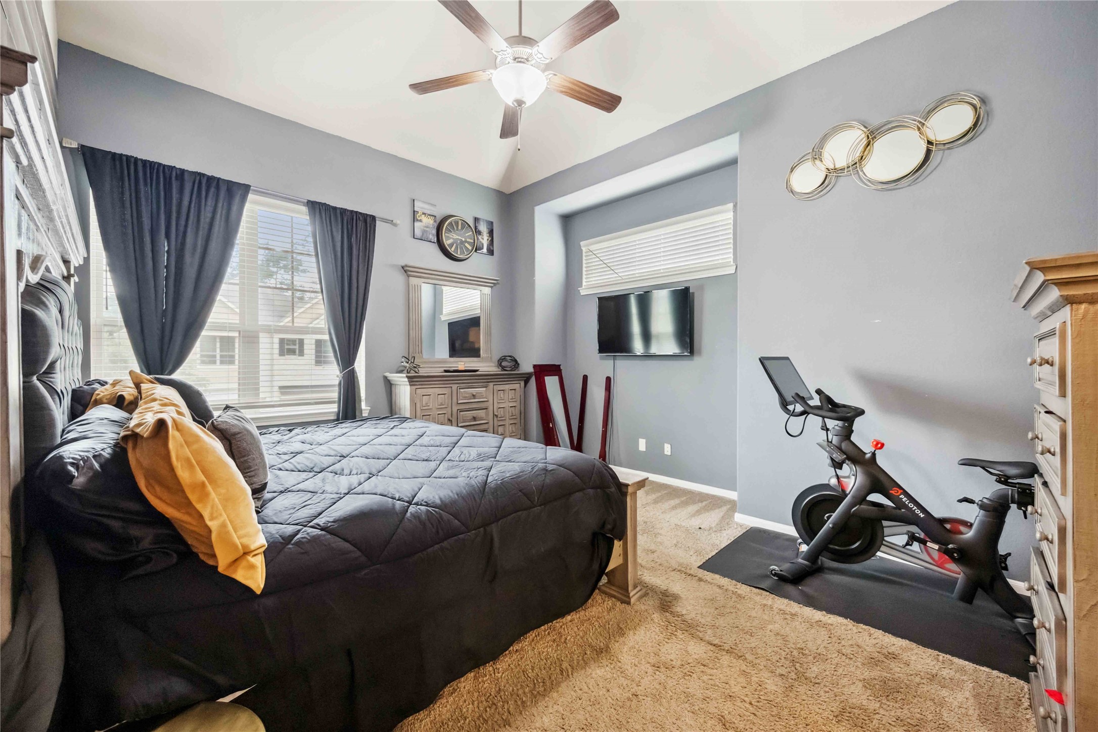 12419 Alora Bluff Trail Humble, TX 77346 - Photo 14 of 28 a bed room with a bed mirror and a window