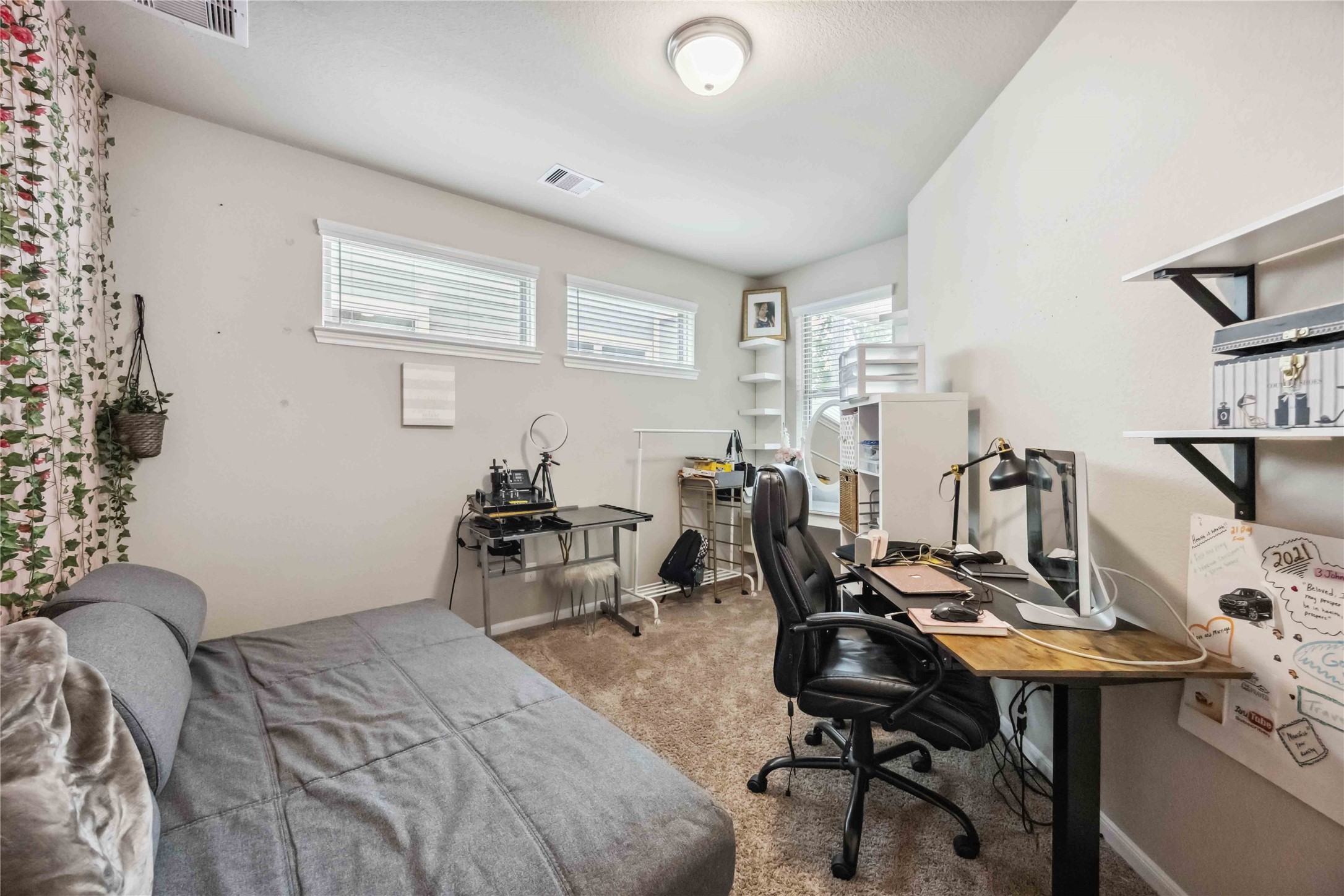 12419 Alora Bluff Trail Humble, TX 77346 - Photo 22 of 28 a bedroom with a workspace