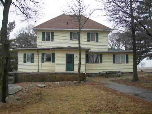 10867 Minier Road Mackinaw, IL 61755 - Photo 1 of 1 a front view of a house with a yard