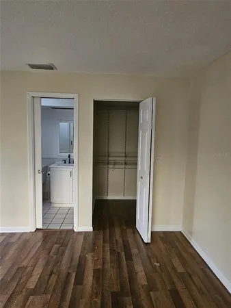 a view of a bathroom with a sink and a shower