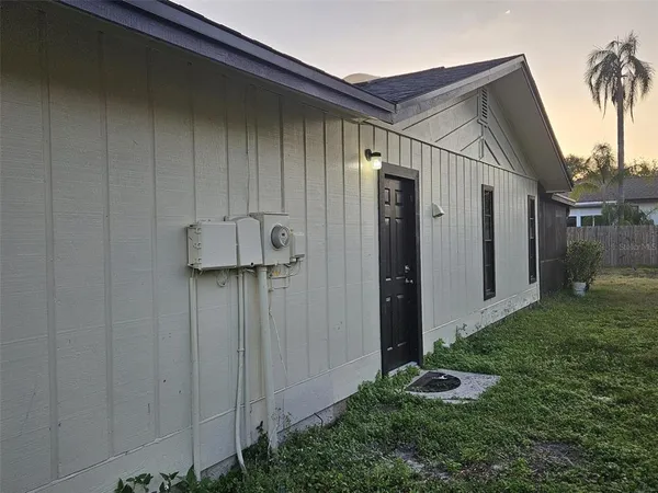a view of a back yard of the house