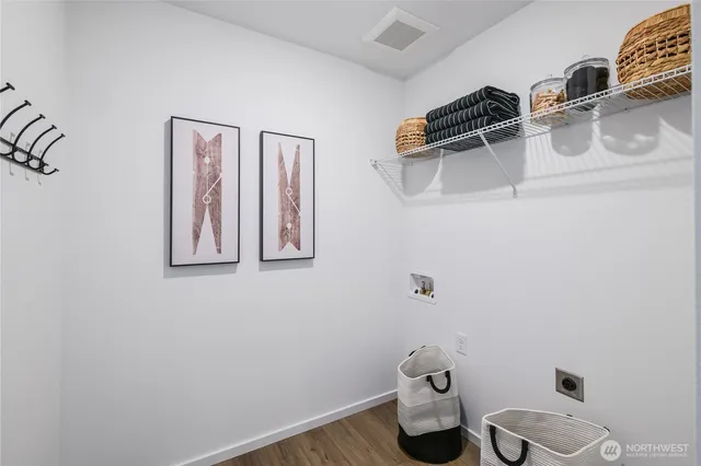 a bathroom with a toilet and a sink