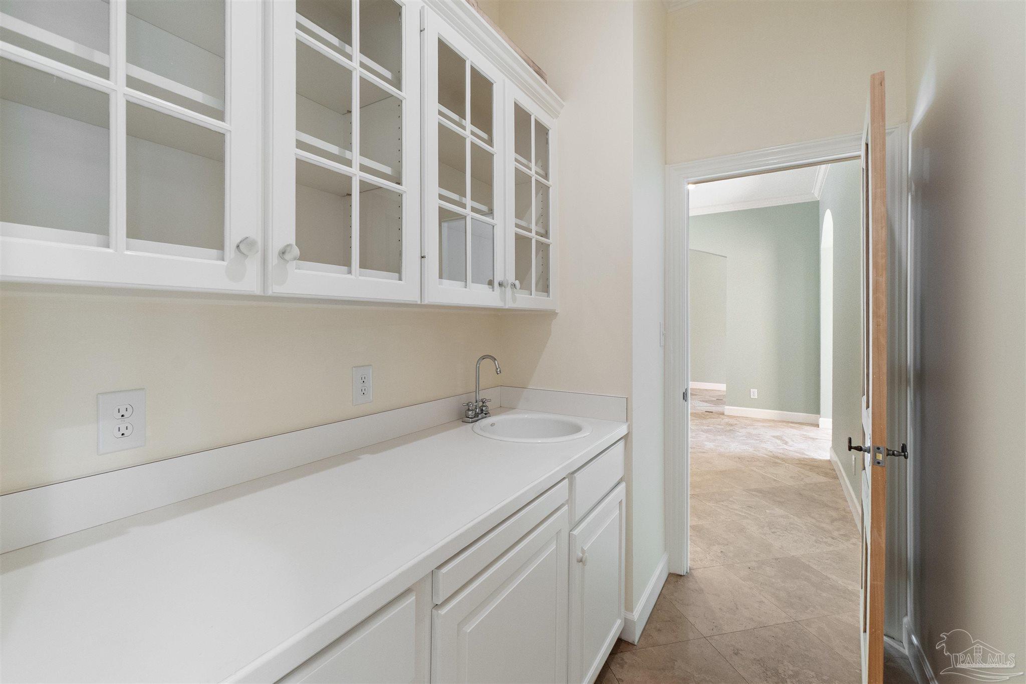 1725 E Lane Pensacola, FL 32501 - Photo 23 of 72 a utility room with a sink dryer and washer