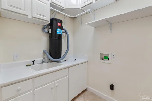 a bathroom with a shower sink and mirror