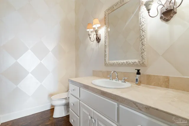 a bathroom with a sink and a toilet