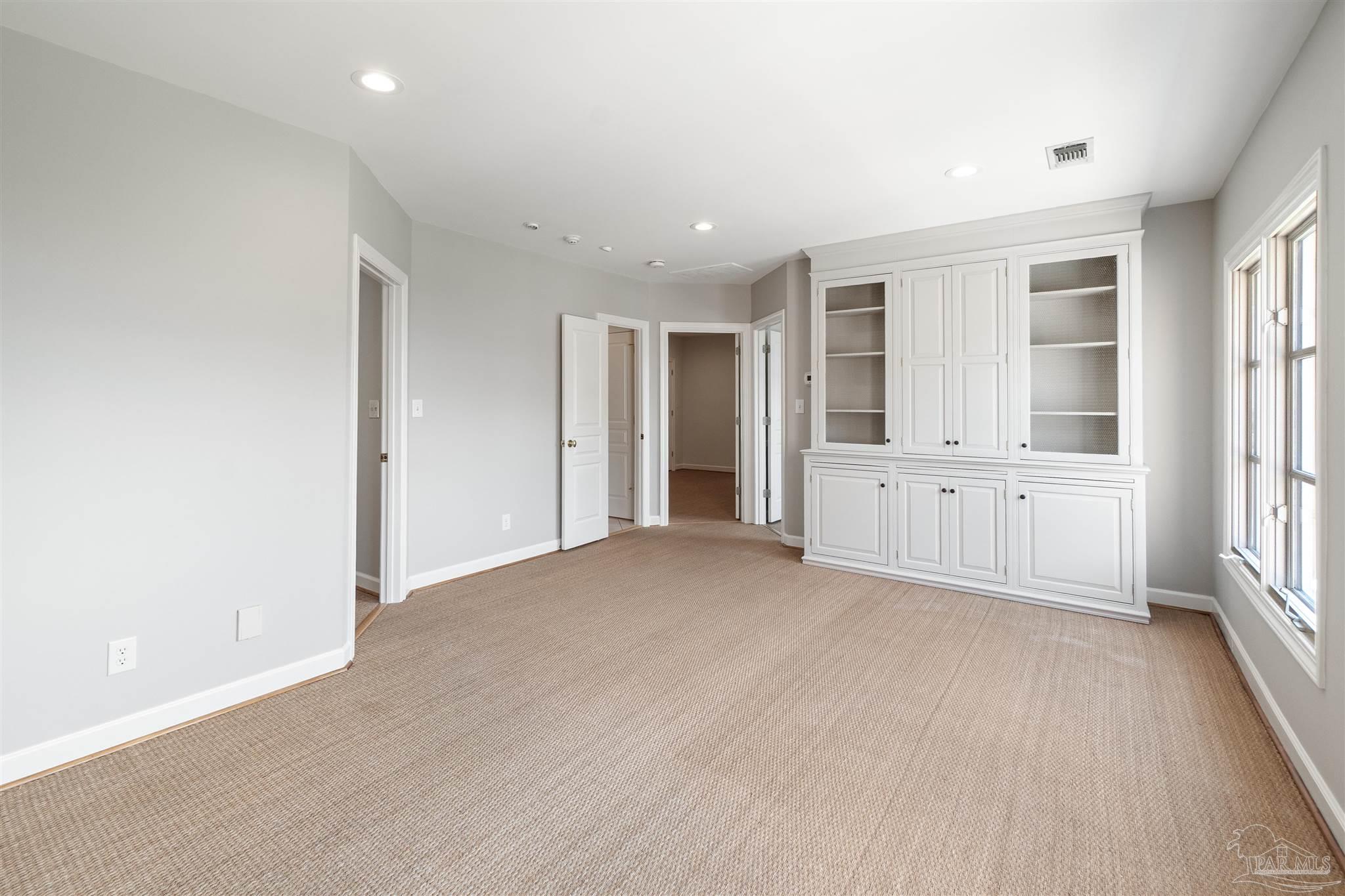 1725 E Lane Pensacola, FL 32501 - Photo 40 of 72 a view of an empty room with a window