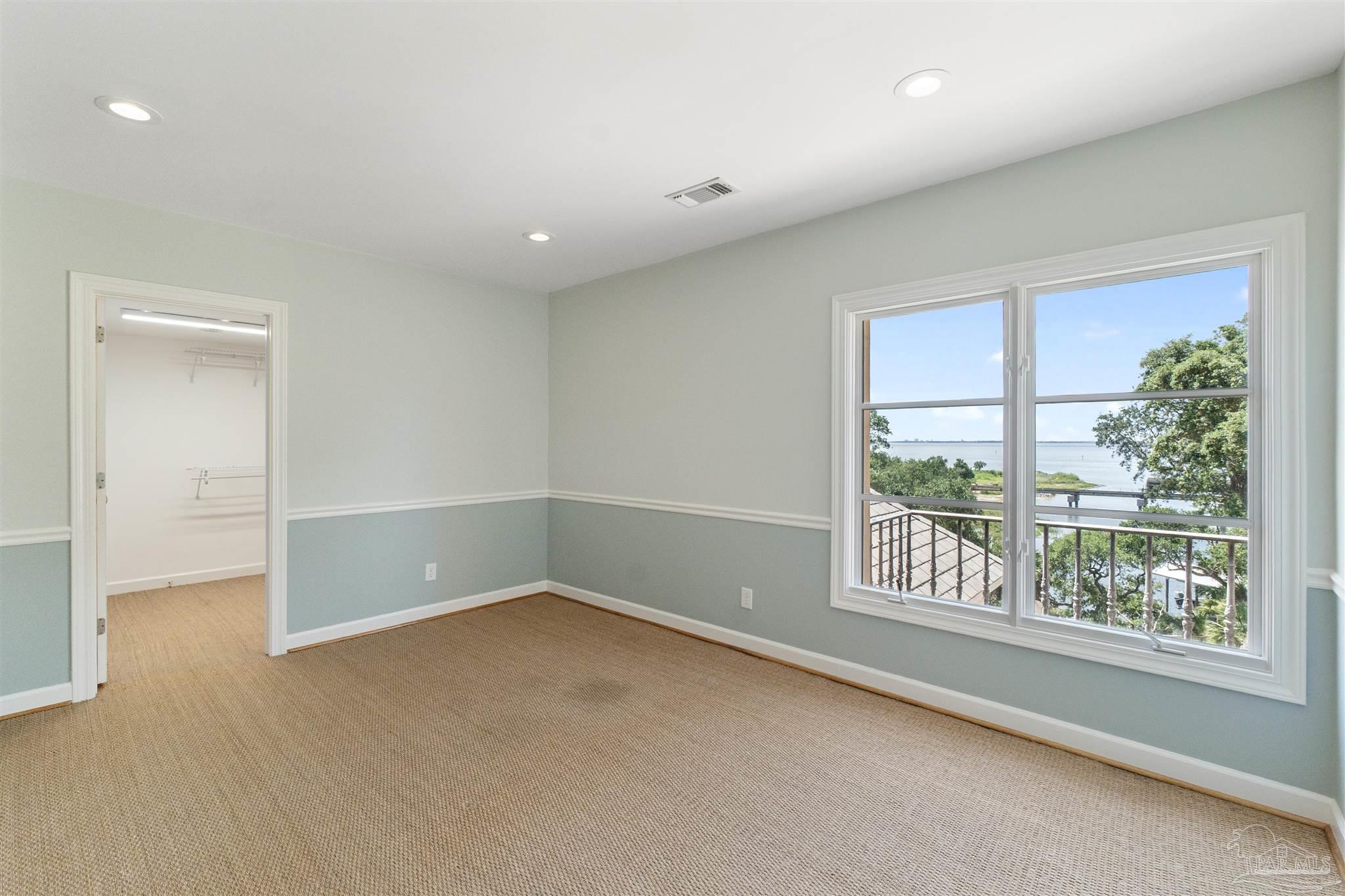 1725 E Lane Pensacola, FL 32501 - Photo 43 of 72 an empty room with windows