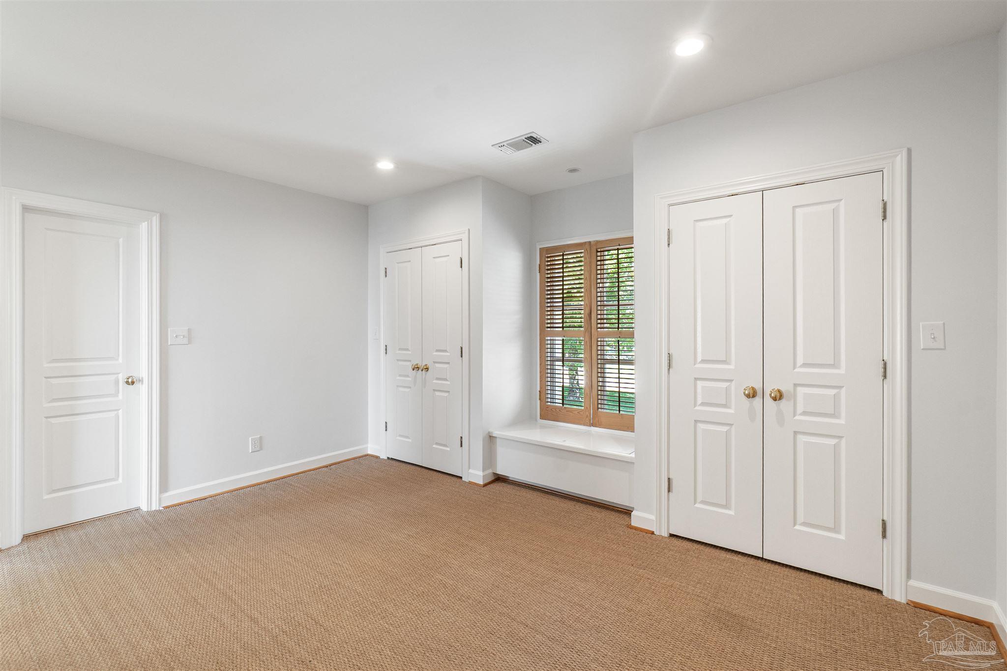 1725 E Lane Pensacola, FL 32501 - Photo 44 of 72 a view of an empty room with a window