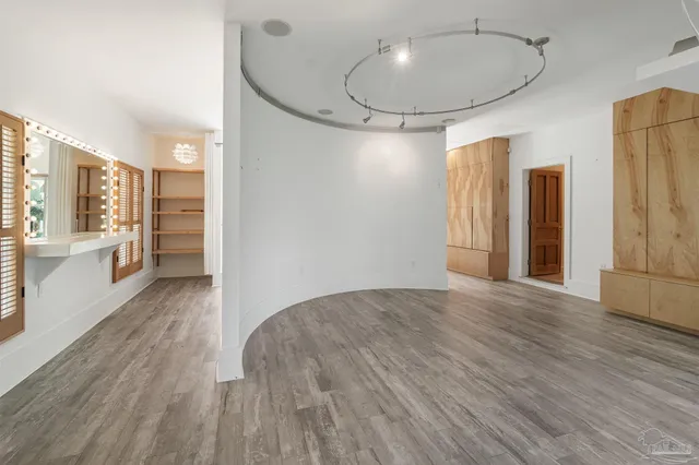 an aerial view of a houses with a yard