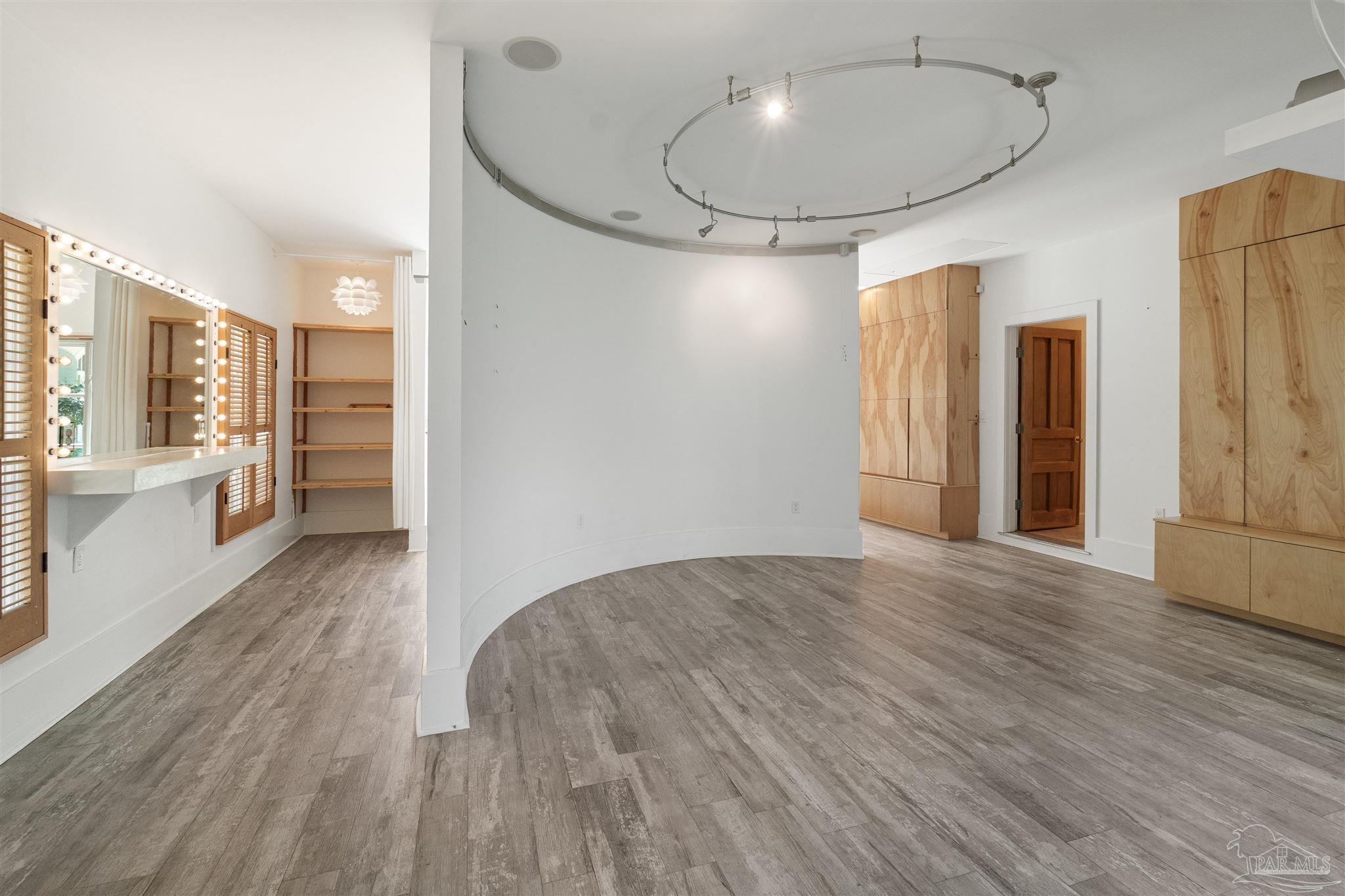 1725 E Lane Pensacola, FL 32501 - Photo 50 of 72 a view of a room with wooden floor and a window