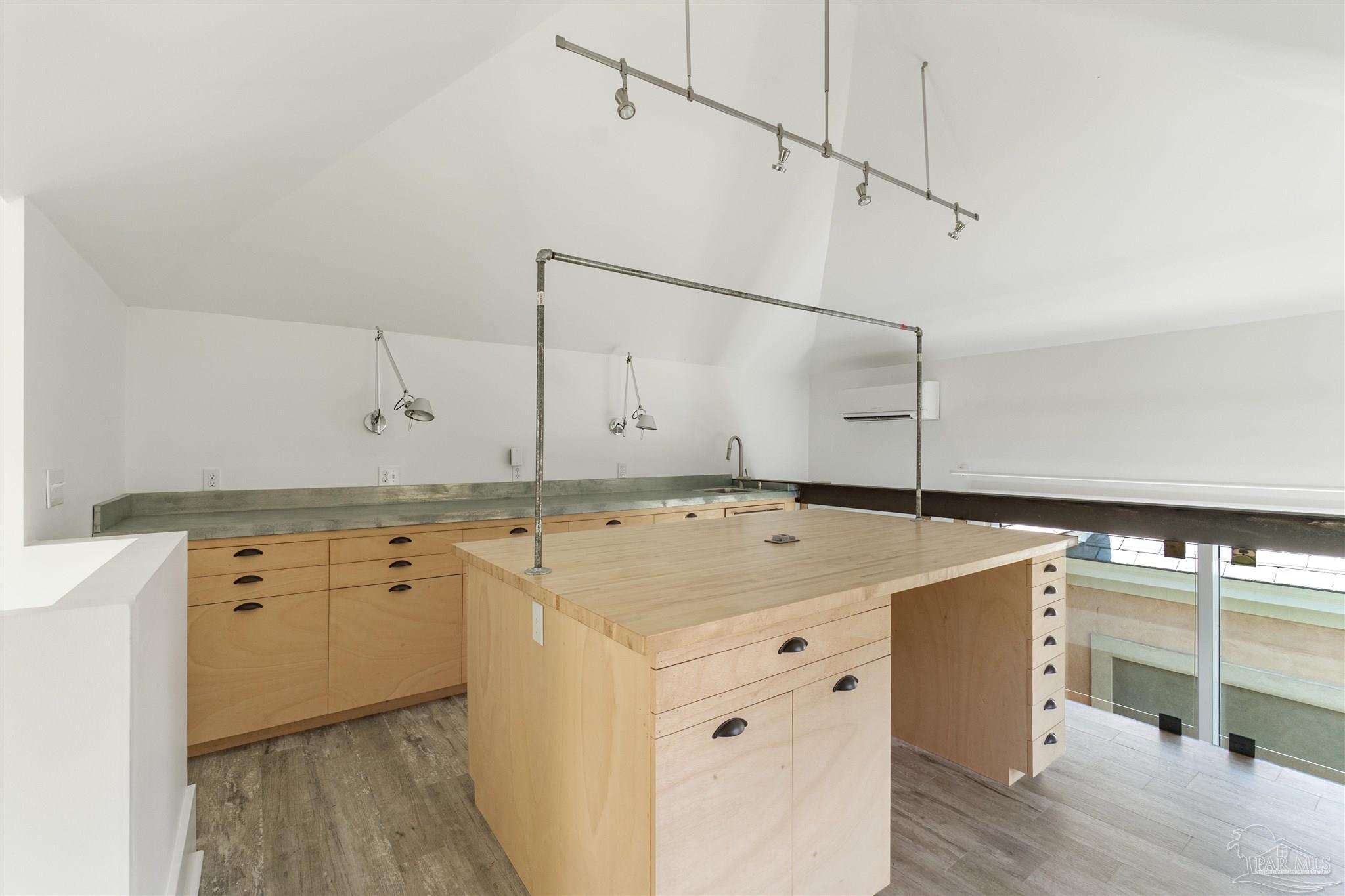 1725 E Lane Pensacola, FL 32501 - Photo 53 of 72 a utility room with cabinets washer and dryer