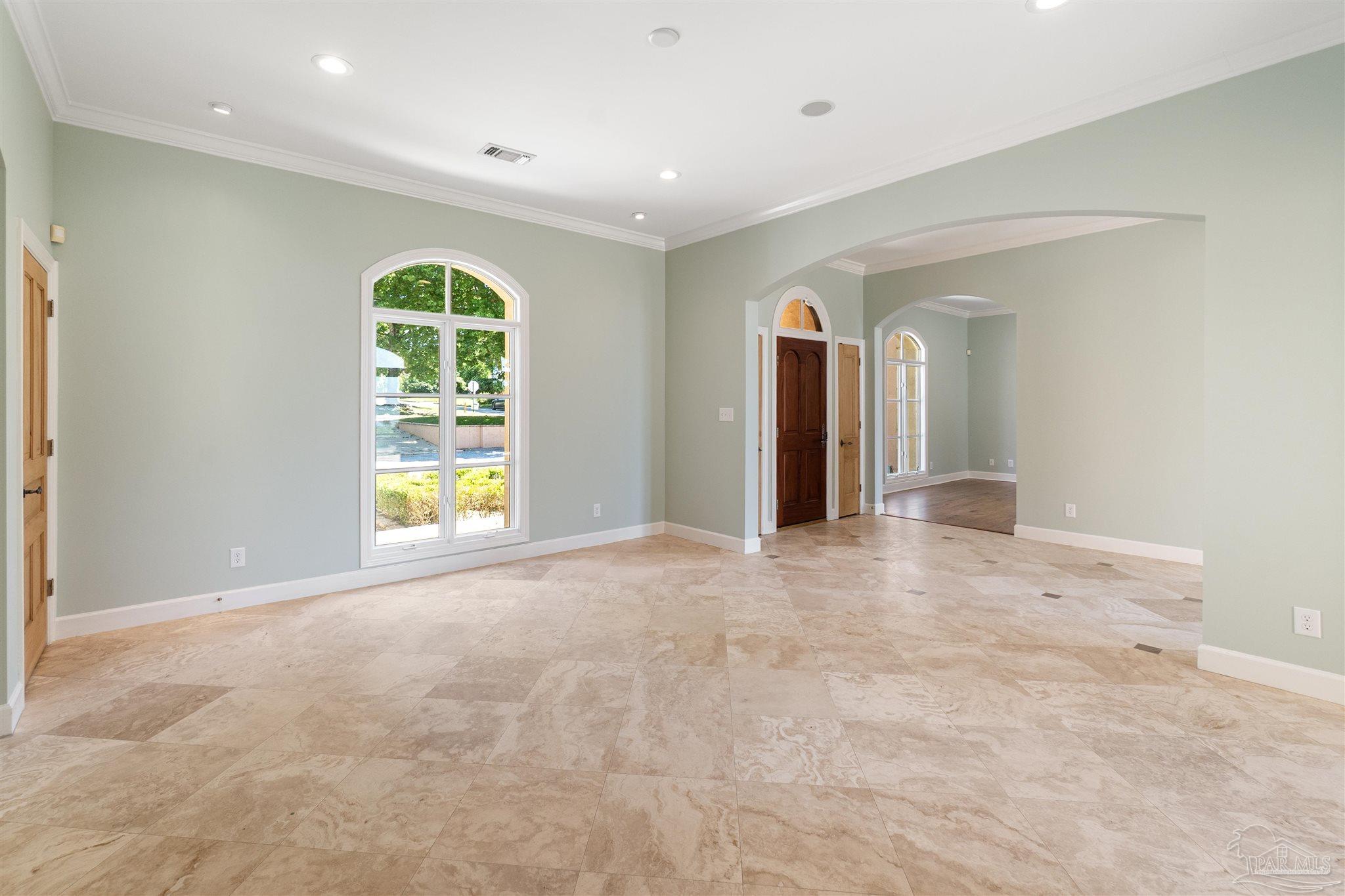 1725 E Lane Pensacola, FL 32501 - Photo 8 of 72 a view of an empty room with a window