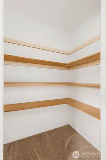 a bathroom with a sink vanity and a mirror