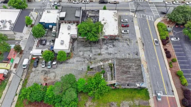 an aerial view of a house with outdoor space