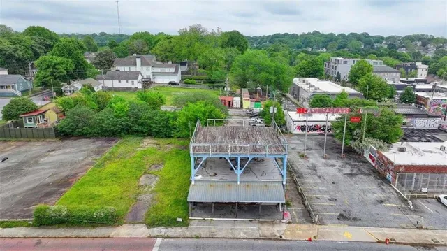 an aerial view of a house with a garden