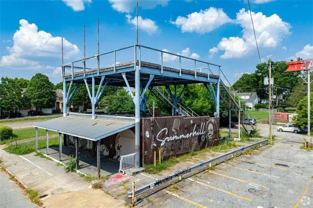 a view of a backyard with a patio