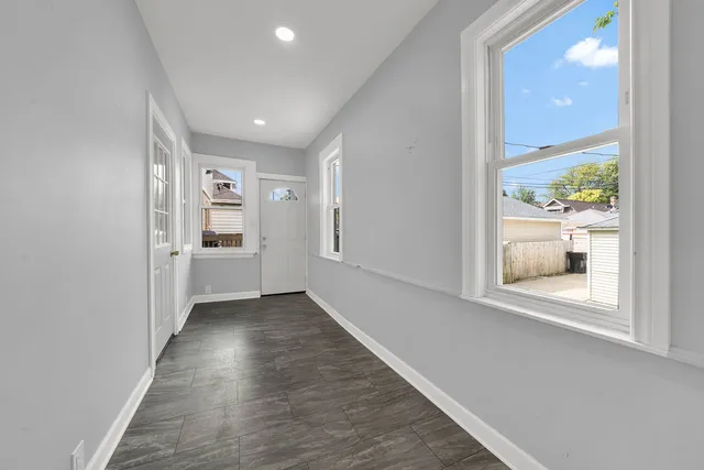 a view of hallway with livingroom