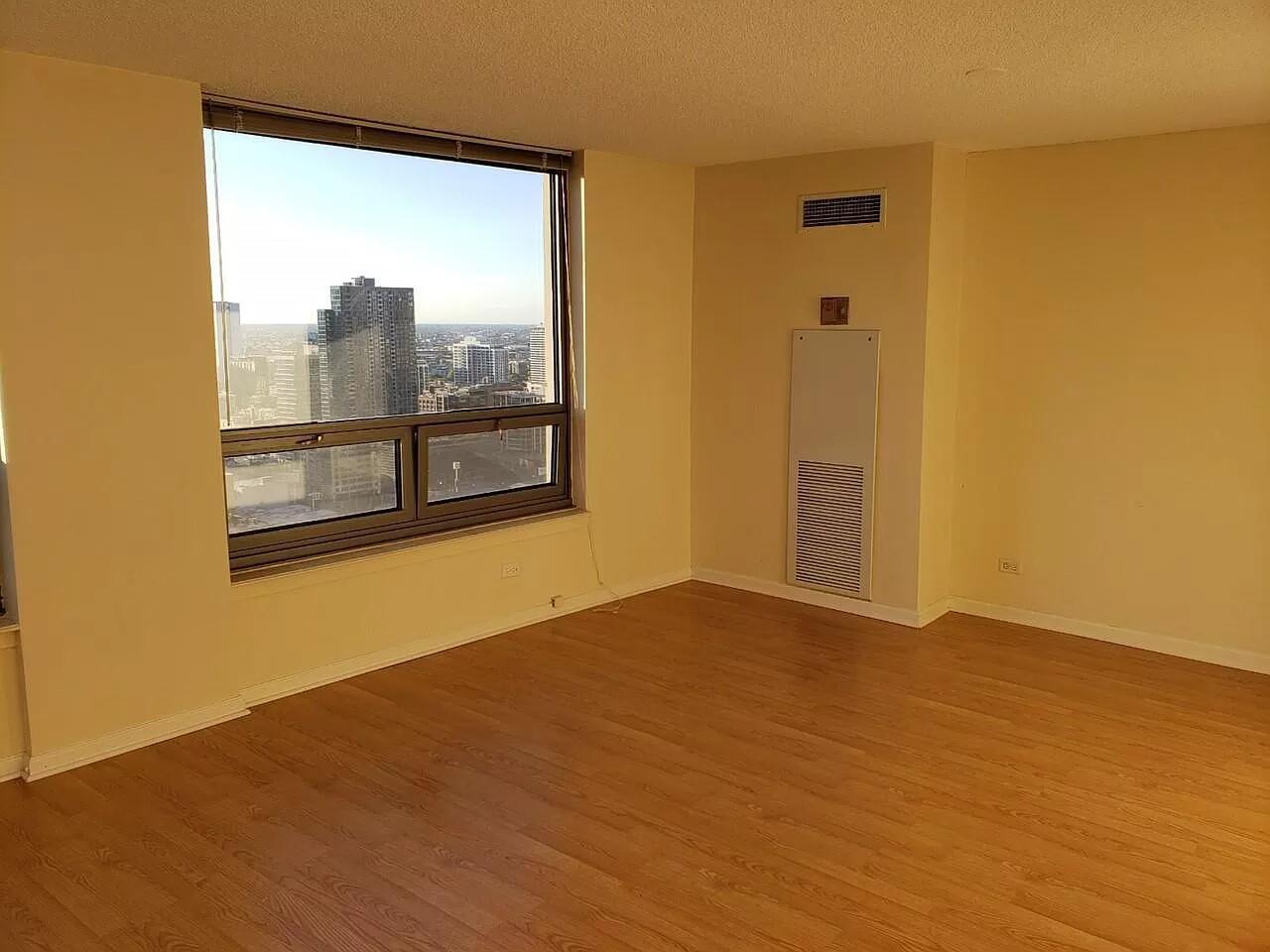 440 North Wabash Avenue, Unit 3703 Chicago, IL 60611 - Photo 11 of 27 a view of an empty room with a window