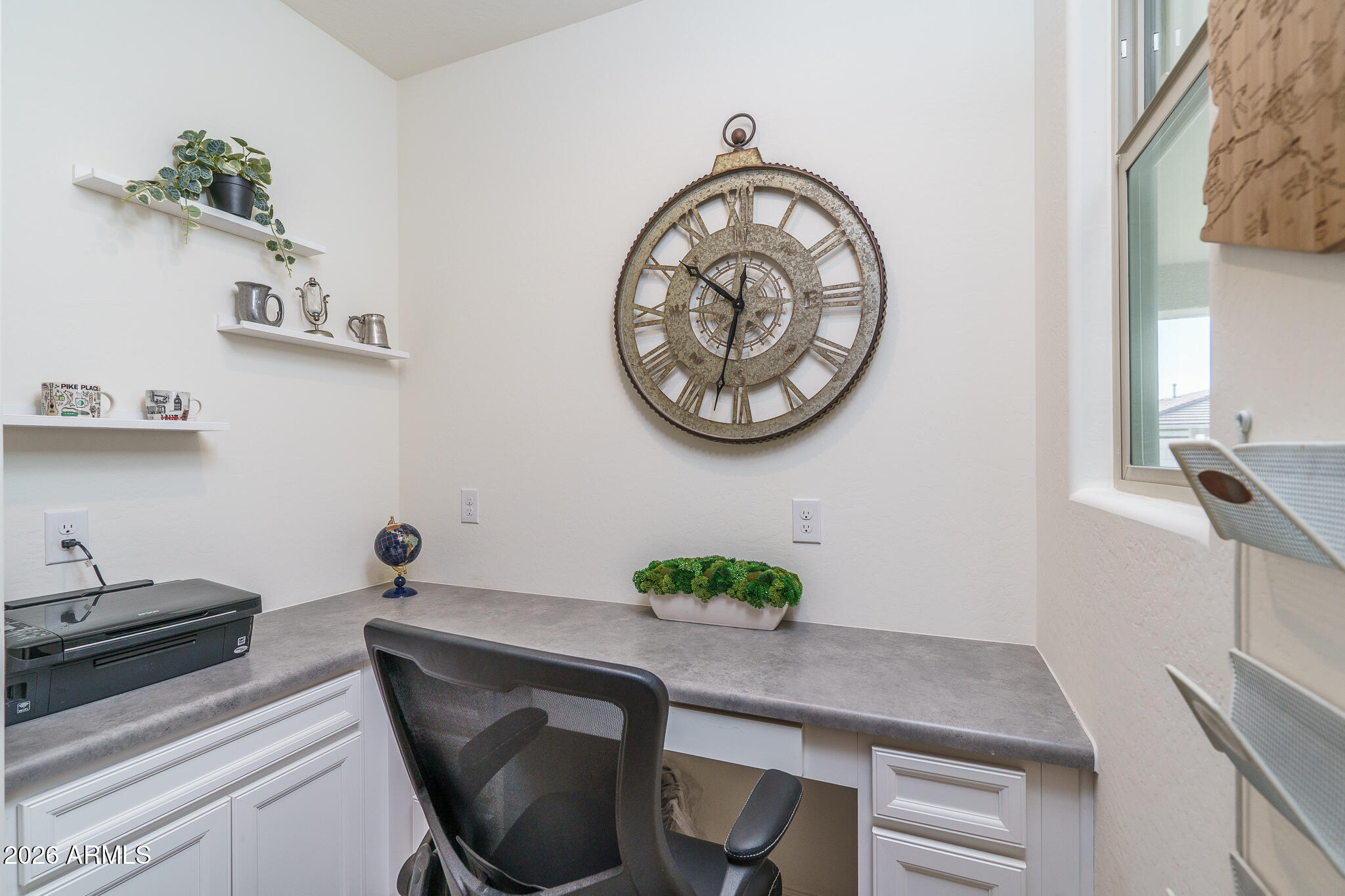 17851 West Red Fox Road Surprise, AZ 85387 - Photo 11 of 42 a table with a vase and a vase of flowers on it