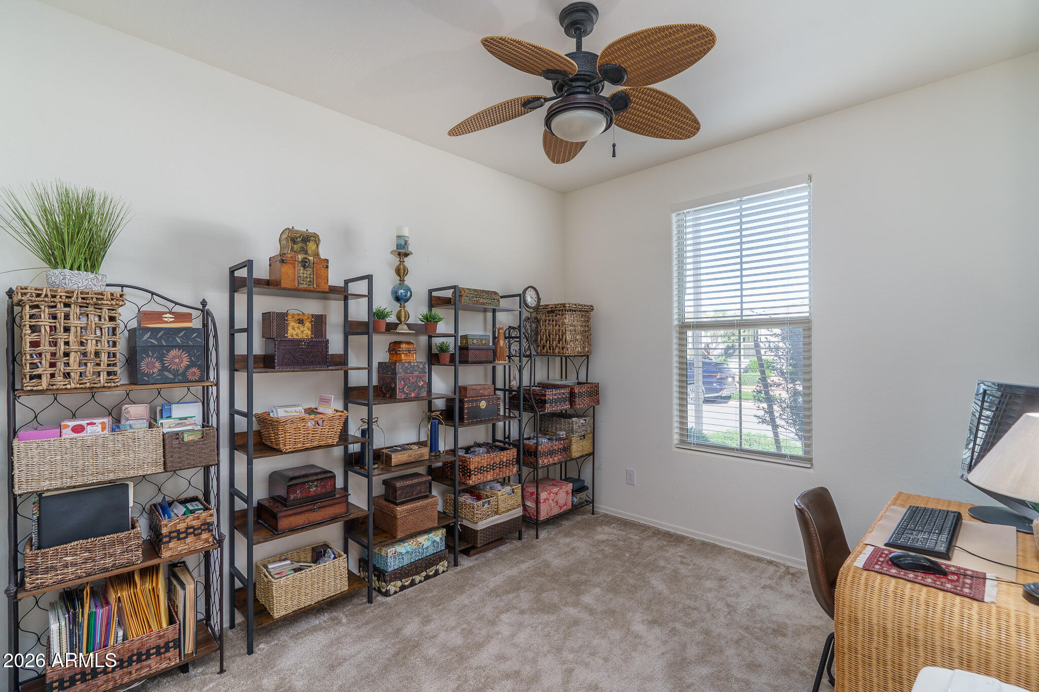 17851 West Red Fox Road Surprise, AZ 85387 - Photo 22 of 42 a view of a livingroom with workspace and a window
