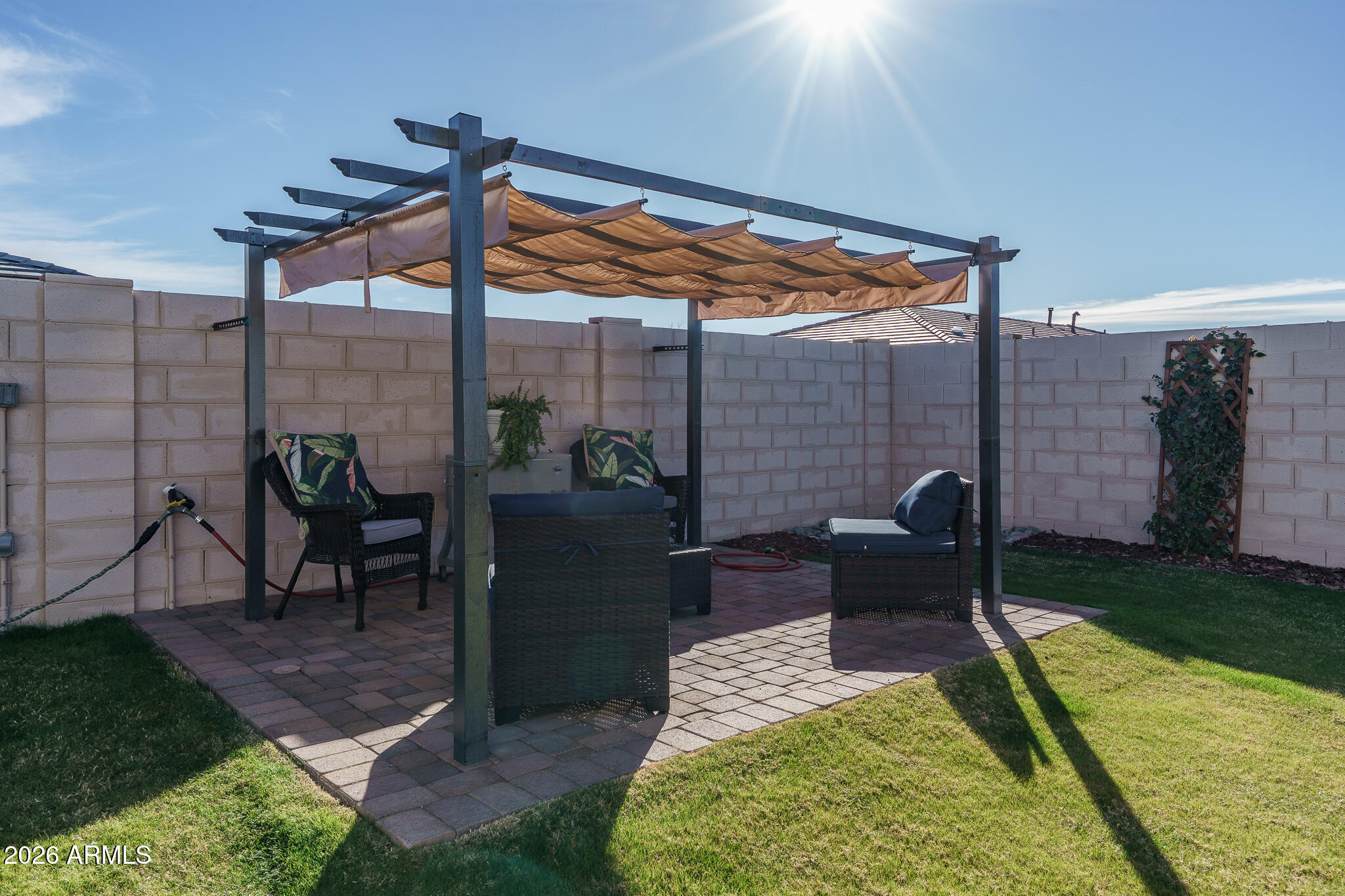 17851 West Red Fox Road Surprise, AZ 85387 - Photo 24 of 42 a patio with table and chairs