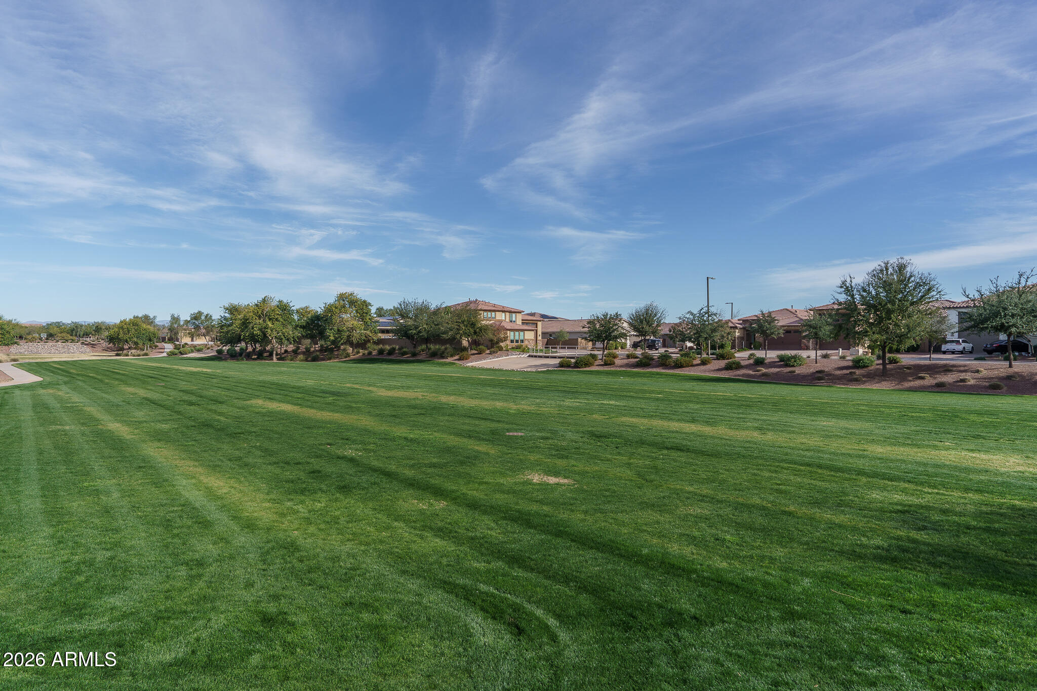 17851 West Red Fox Road Surprise, AZ 85387 - Photo 39 of 42 a view of grassy field with playground