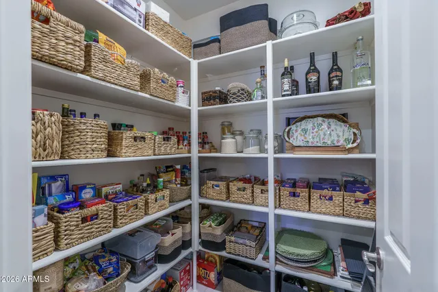 a room with book shelf and a shelf