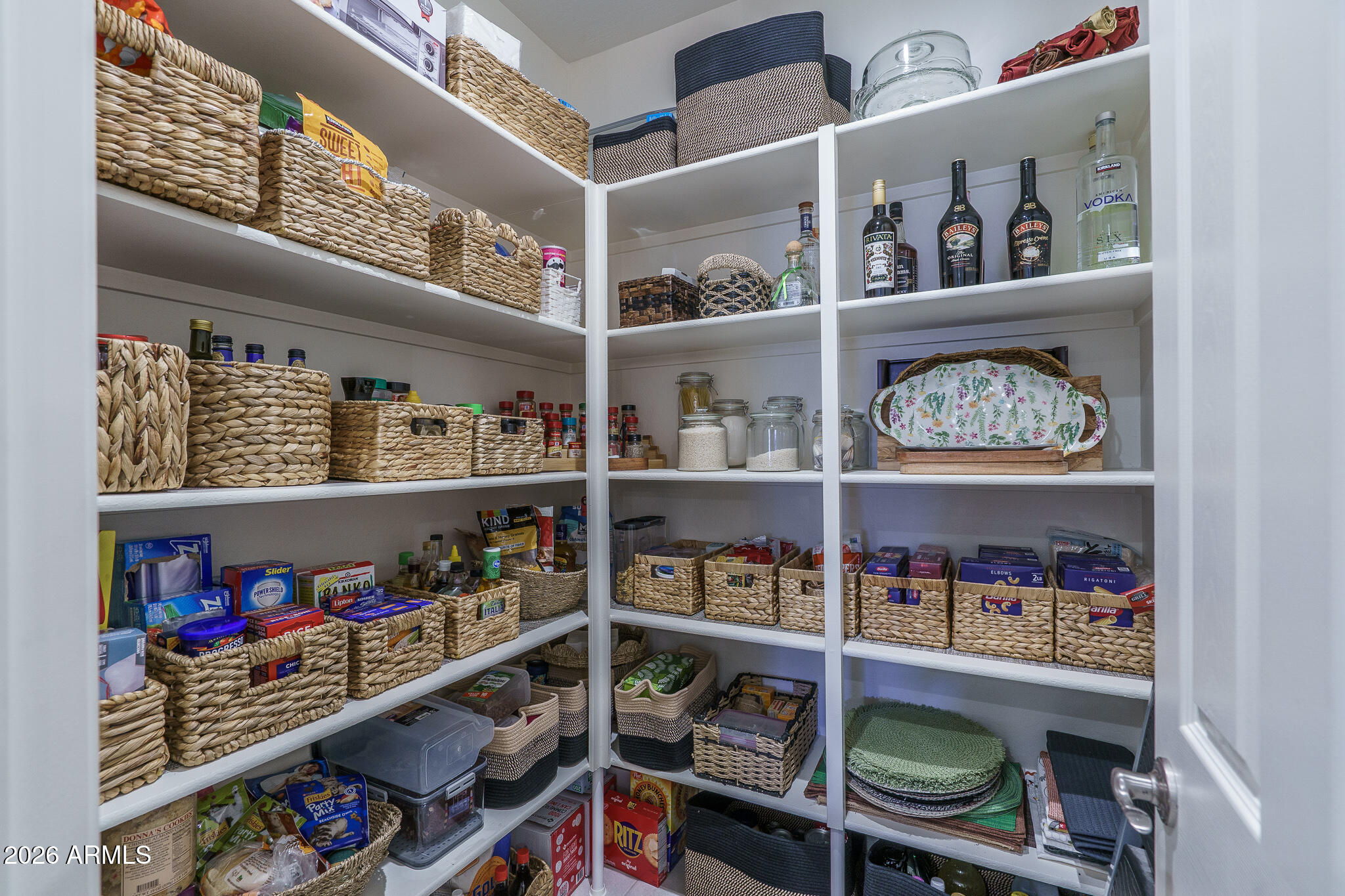 17851 West Red Fox Road Surprise, AZ 85387 - Photo 6 of 42 a room with book shelf and a shelf