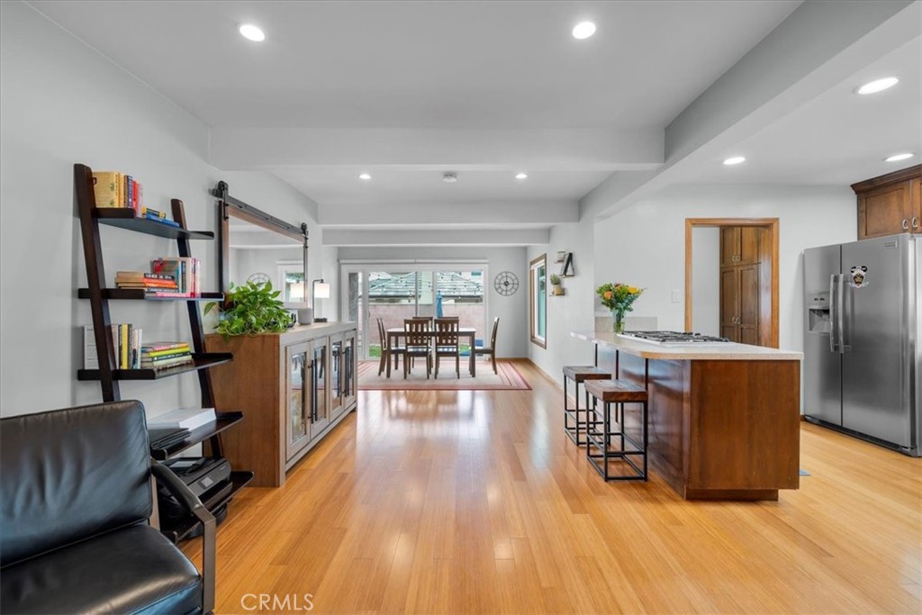 22643 Draille Drive Torrance, CA 90505 - Photo 11 of 33 a living room with furniture a flat screen tv and a table