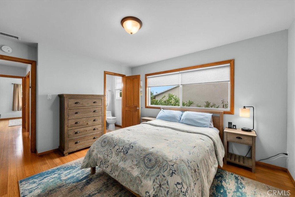 22643 Draille Drive Torrance, CA 90505 - Photo 16 of 33 a bedroom with a bed and a window