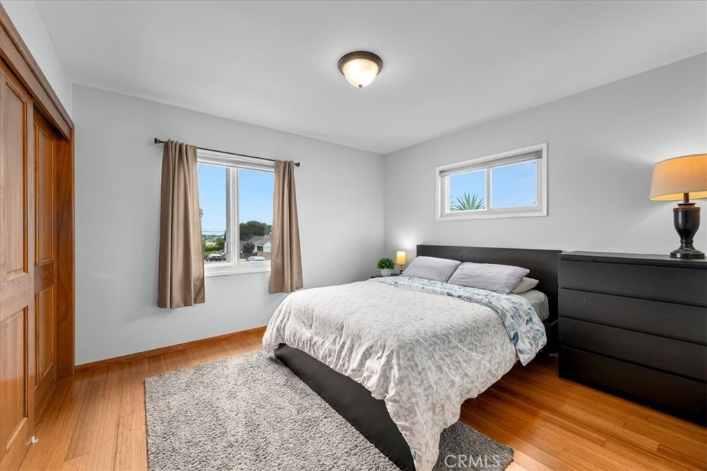 22643 Draille Drive Torrance, CA 90505 - Photo 22 of 33 a bedroom with a bed and painting on the wall