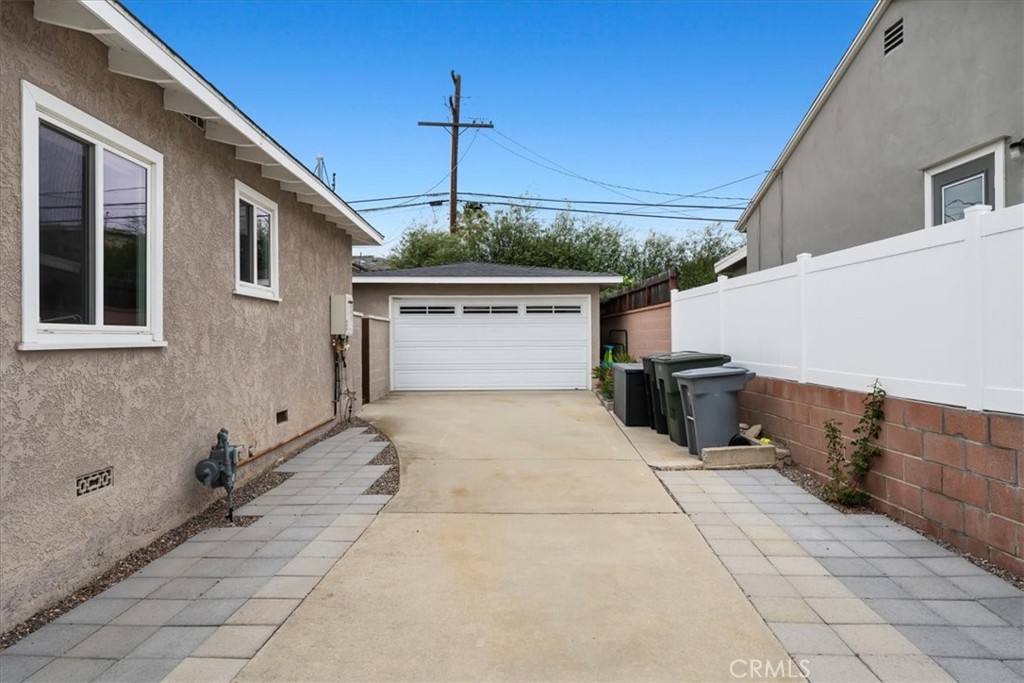 22643 Draille Drive Torrance, CA 90505 - Photo 31 of 33 Picture taken from gate at front corner of home. As you can see, this is a long driveway capable of holding many cars or even a boat or RV.