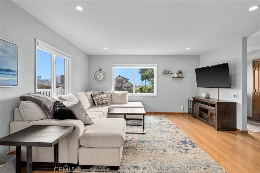 22643 Draille Drive Torrance, CA 90505 - Photo 5 of 33 a living room with furniture and a flat screen tv