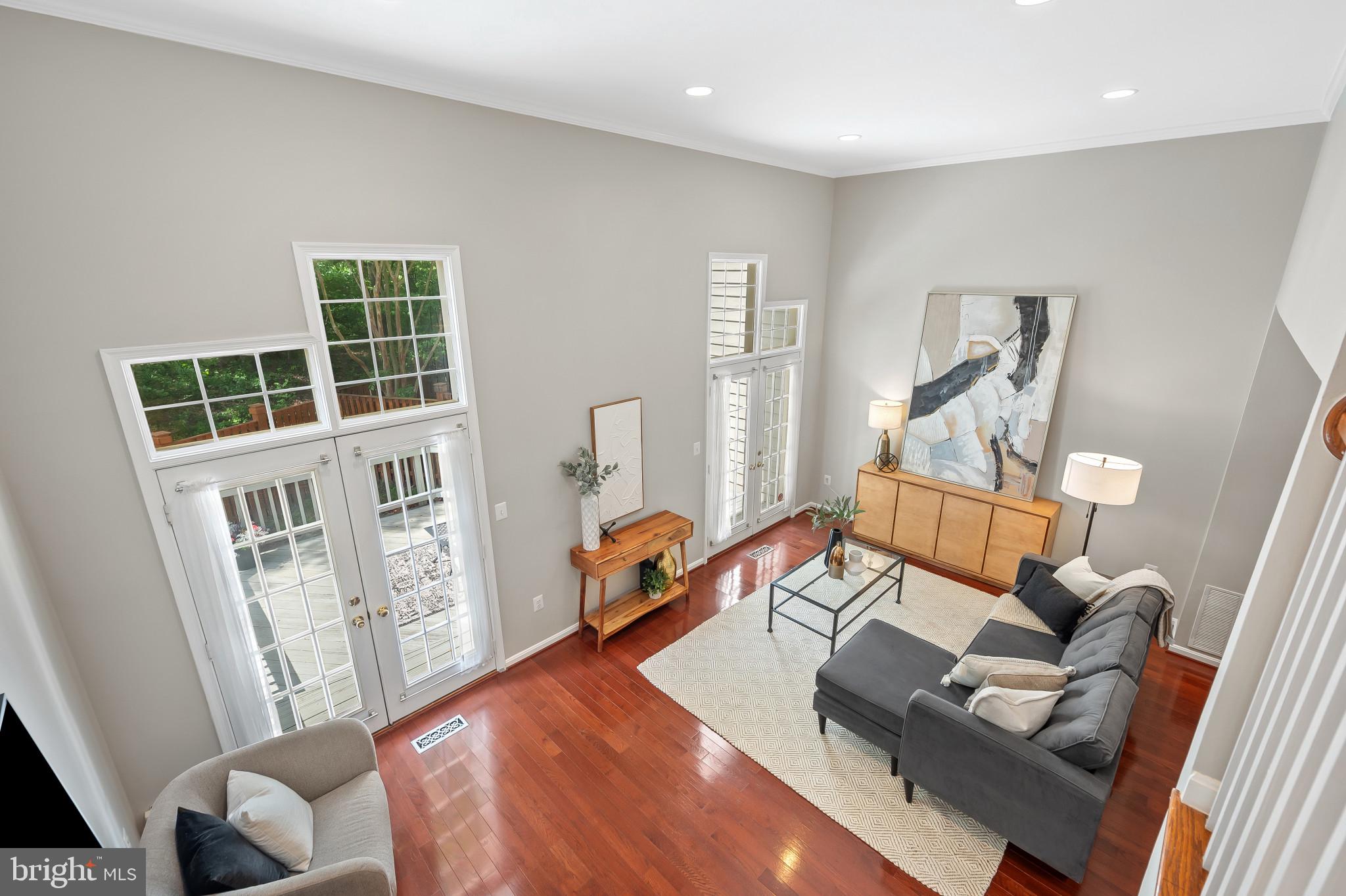 1242 Weatherstone Court Reston, VA 20194 - Photo 13 of 40 a living room with furniture and wooden floor