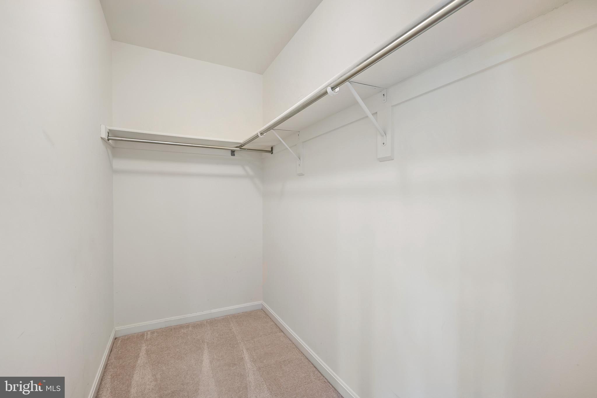 1242 Weatherstone Court Reston, VA 20194 - Photo 19 of 40 a view of small space with racks on the wall
