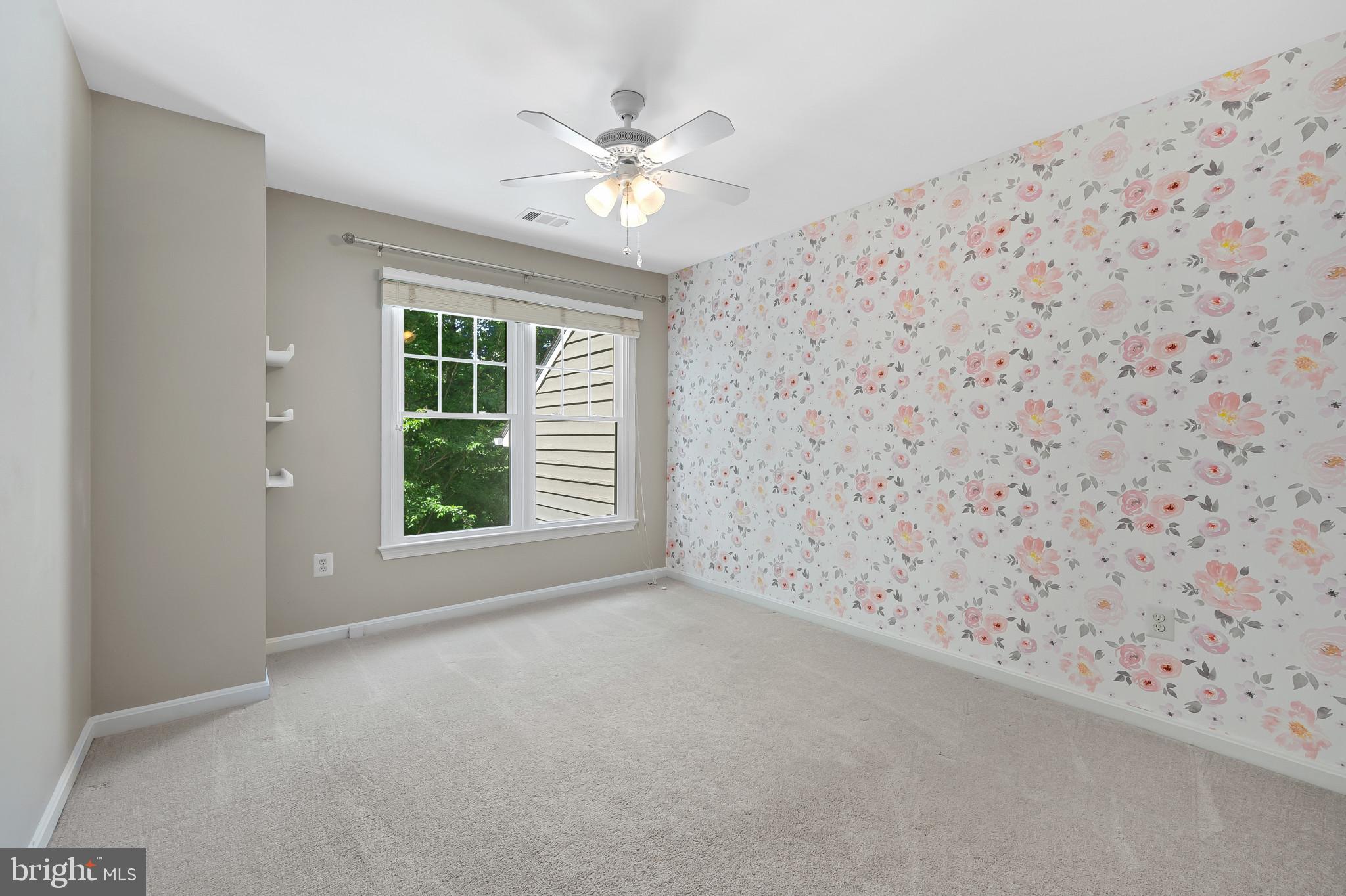 1242 Weatherstone Court Reston, VA 20194 - Photo 26 of 40 en empty room with windows