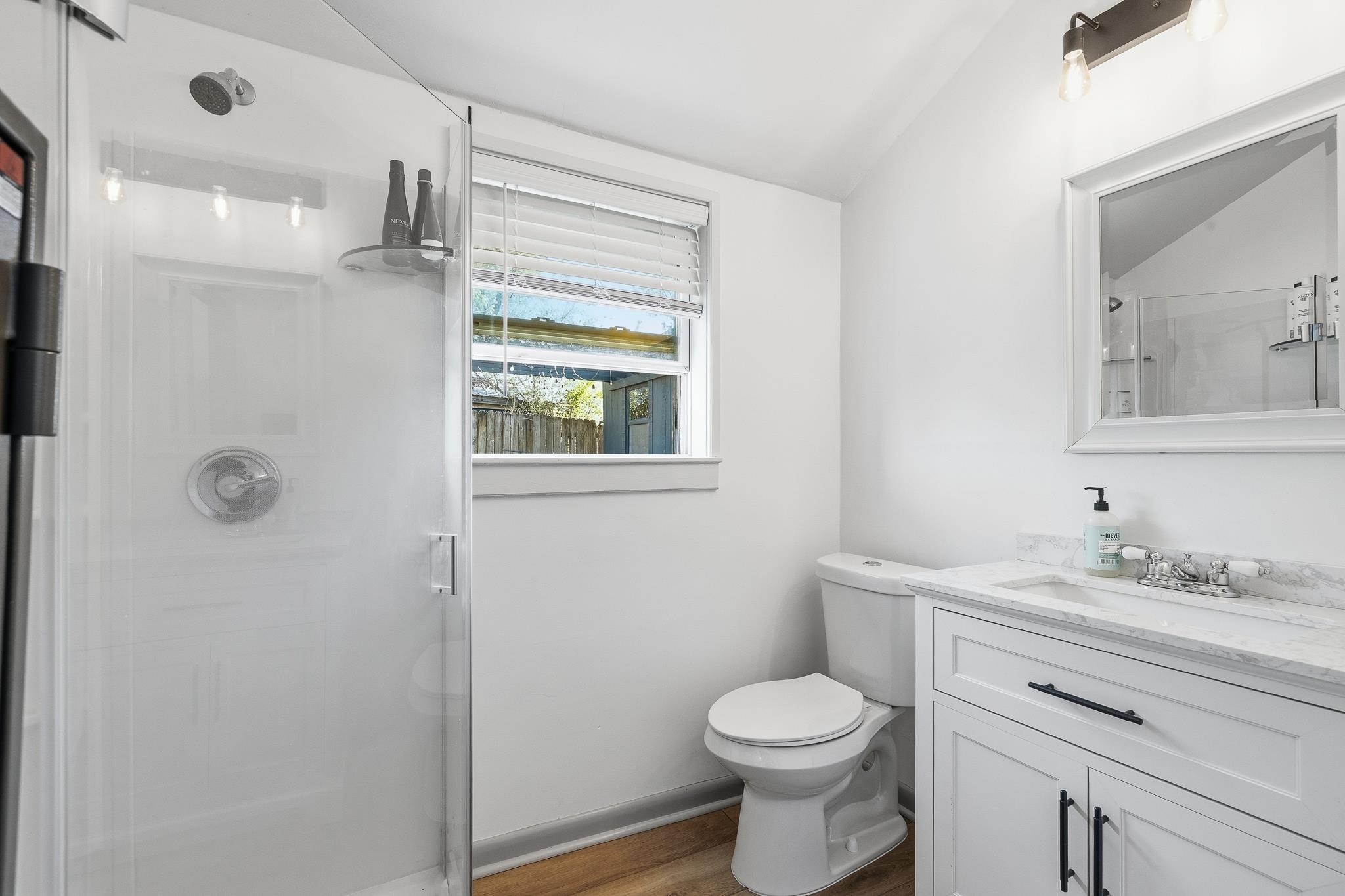 1044 Bruce Street Memphis, TN 38104 - Photo 27 of 34 a bathroom with a sink toilet and shower
