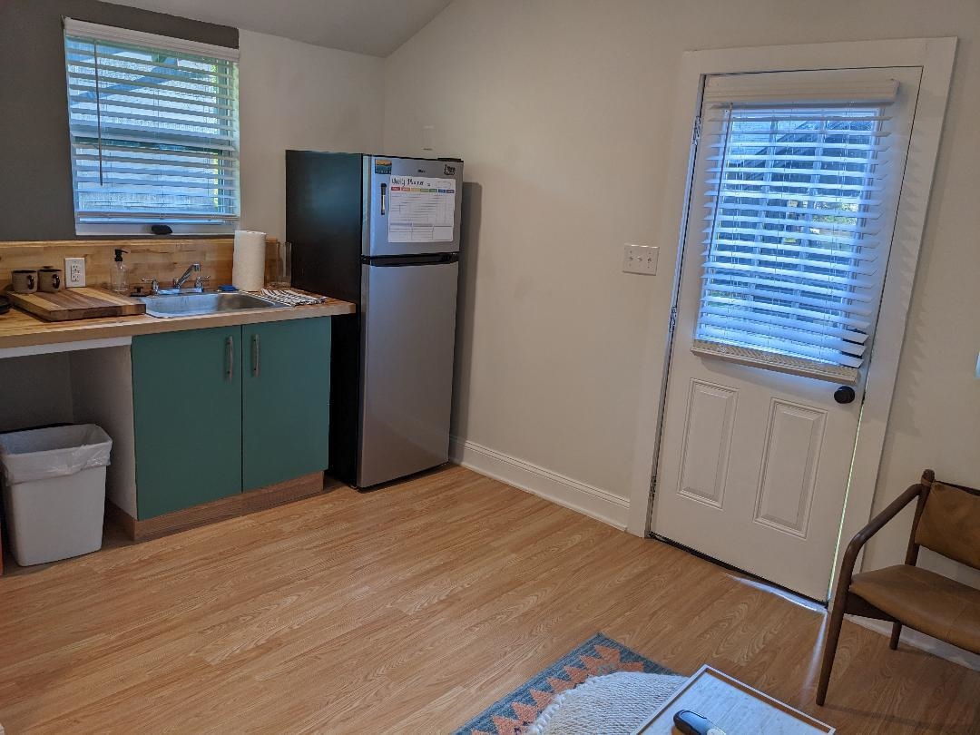 1044 Bruce Street Memphis, TN 38104 - Photo 33 of 34 a room with window and wooden floor