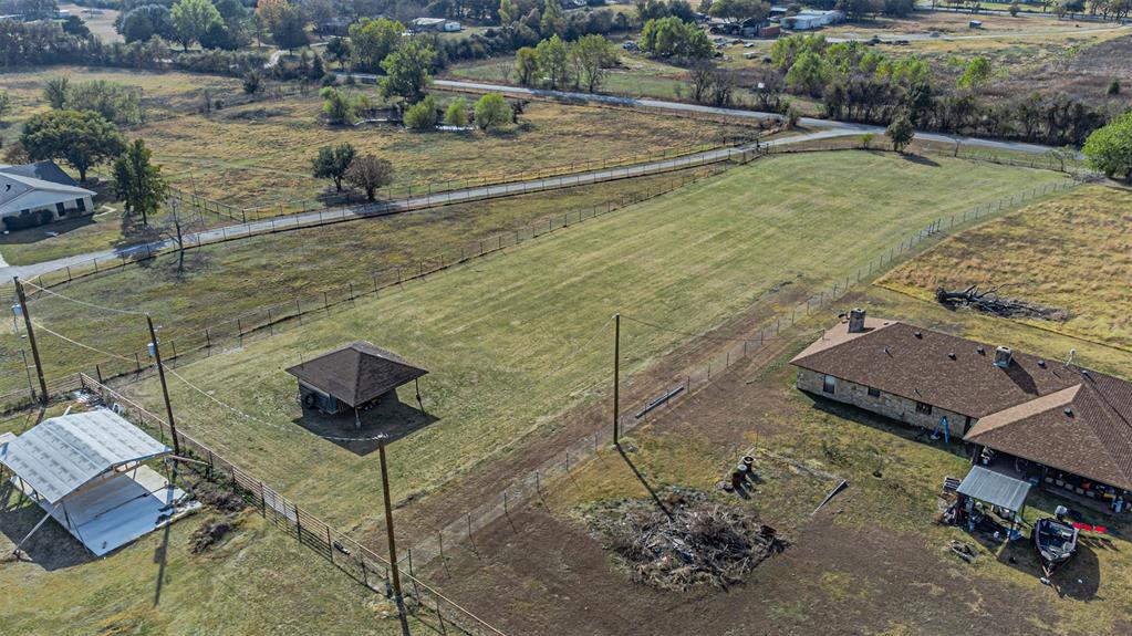 2121 Rock Creek Road Crowley, TX 76036 - Photo 11 of 22 a view of a backyard