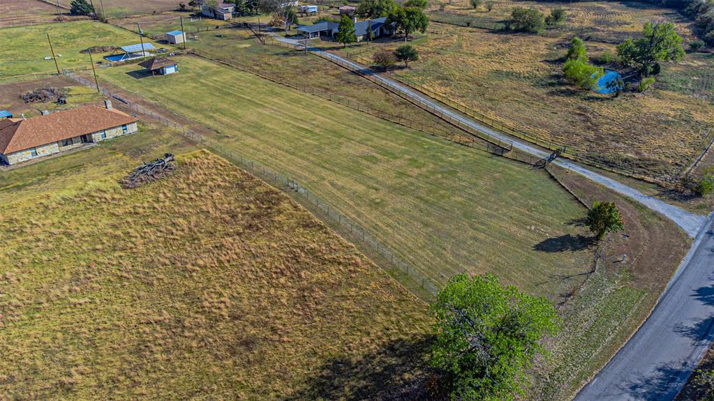 2121 Rock Creek Road Crowley, TX 76036 - Photo 15 of 22 a view of a backyard