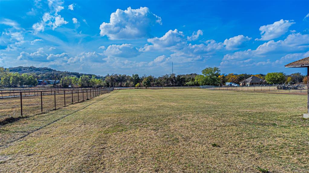 2121 Rock Creek Road Crowley, TX 76036 - Photo 8 of 22 a view of a pathway with a yard
